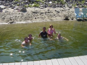 Guests swimming in the Snake River at Copper Creek